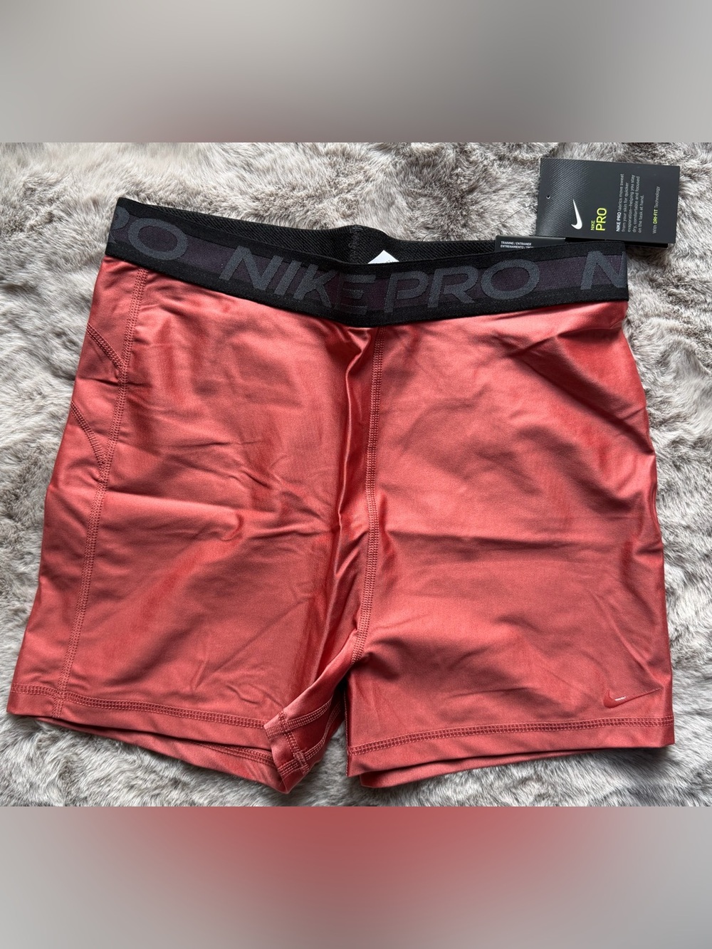 Nike Women's Pro Tight Fit Shorts in Coral Pink